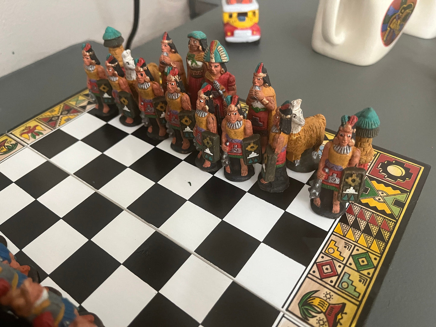 Colombian chess. Carved in wood figures. Colonization representation