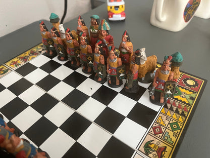 Colombian chess. Carved in wood figures. Colonization representation