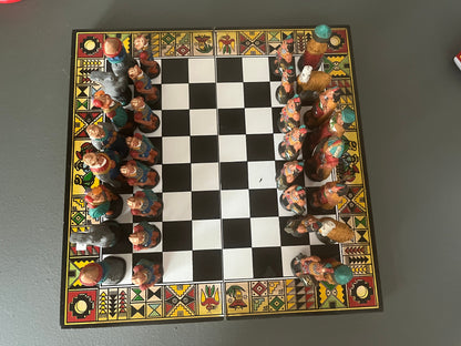 Colombian chess. Carved in wood figures. Colonization representation